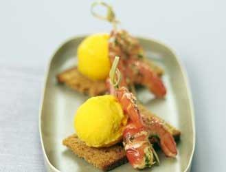 Ginger prawn tails on gingerbread toast and mango sorbet