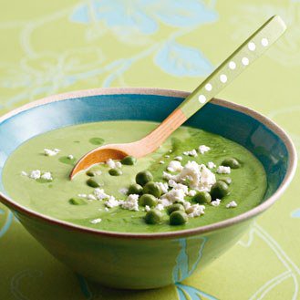 Creamy peas soup with goat cheese